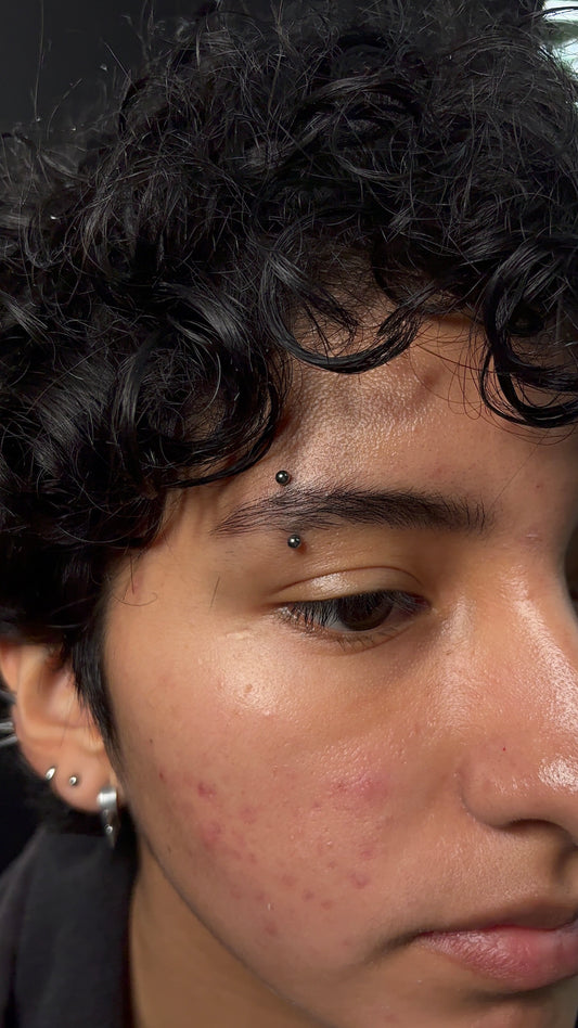 Eyebrow piercing